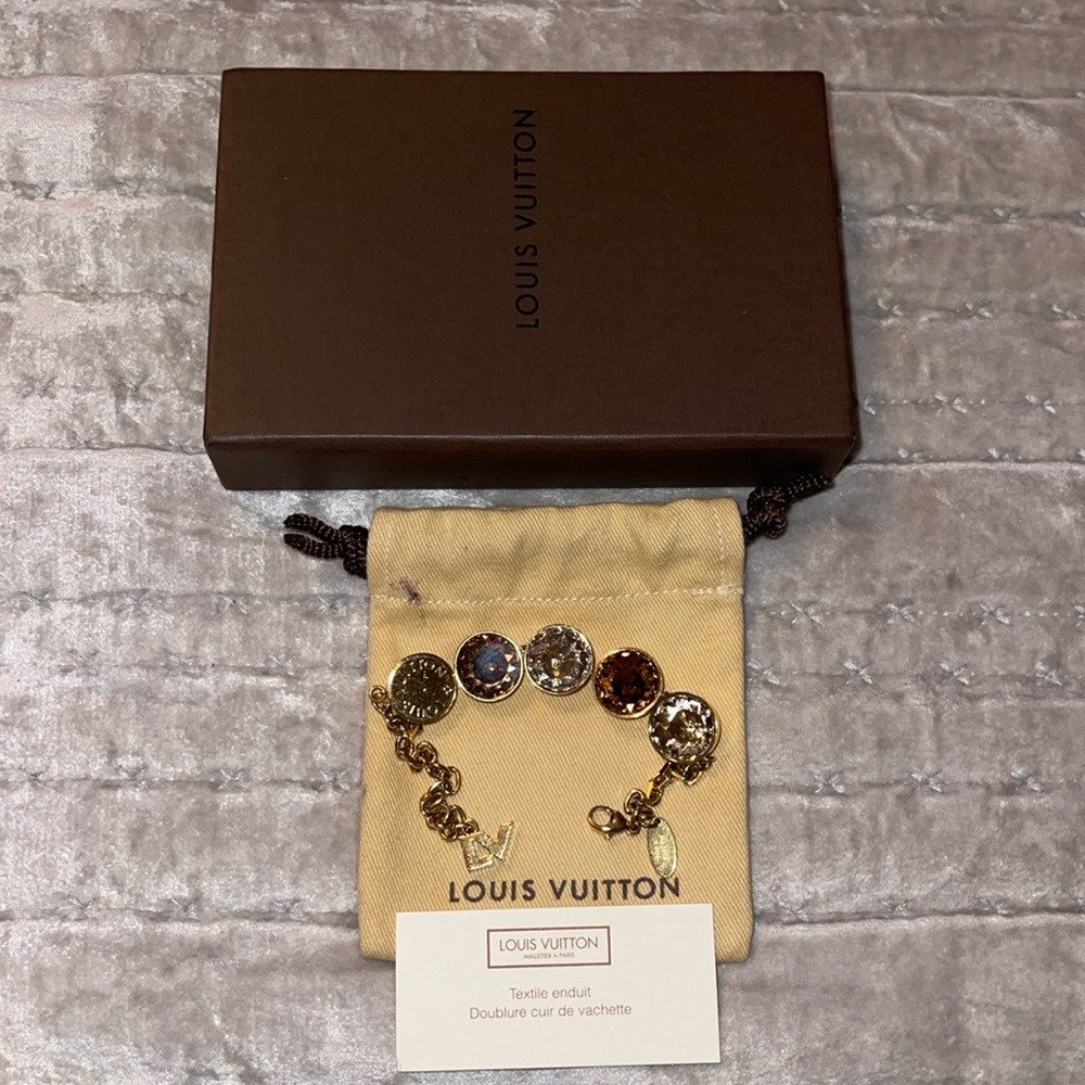 Louis Vuitton rare find excellent condition gem bracelet comes with dust bag/box